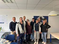 Bastian Sieler und Sandra Slusarek mit dem Team der Adalbert Zajadacz GmbH & Co. KG